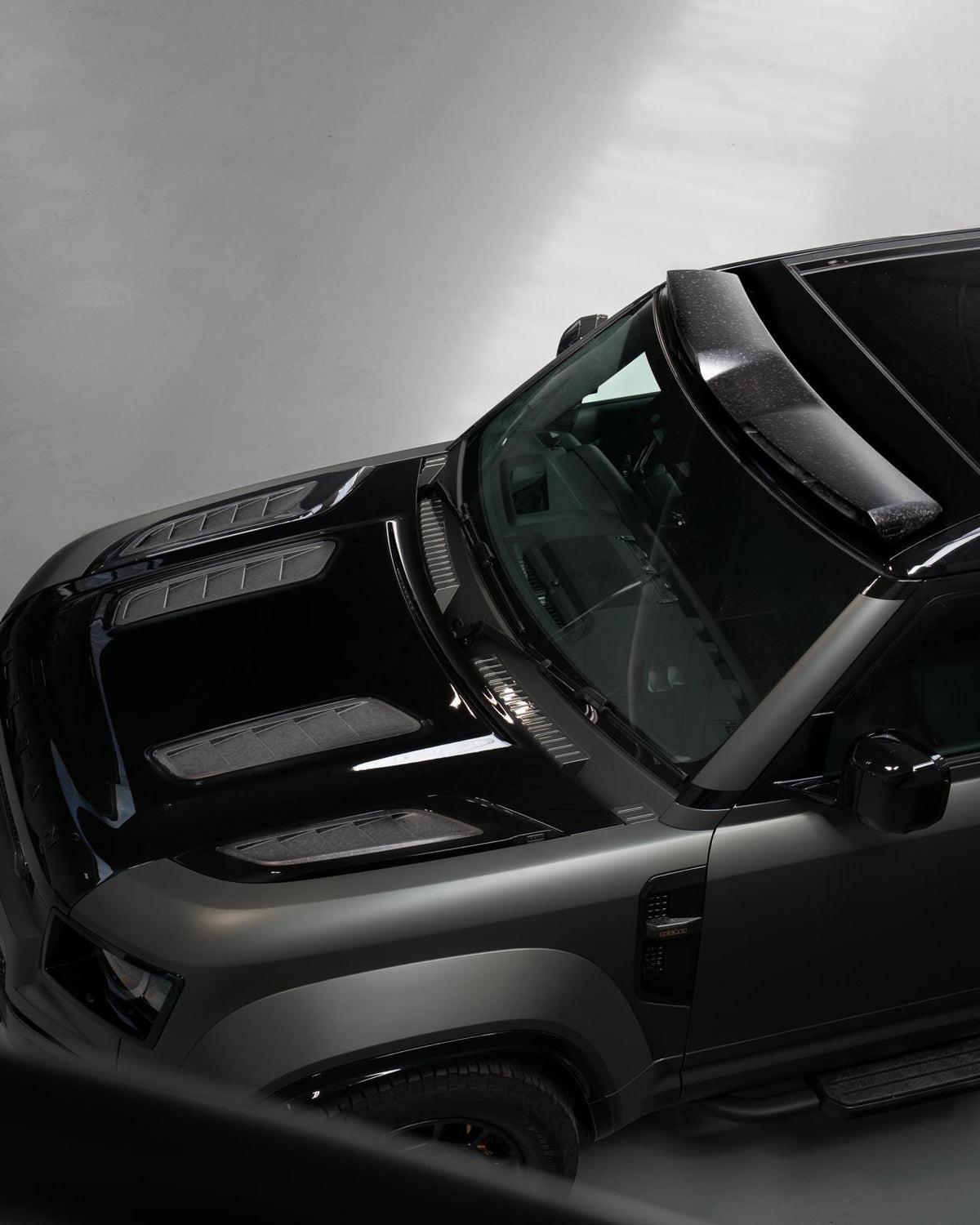 Urban forged carbon quad vent hood on Defender OCTA