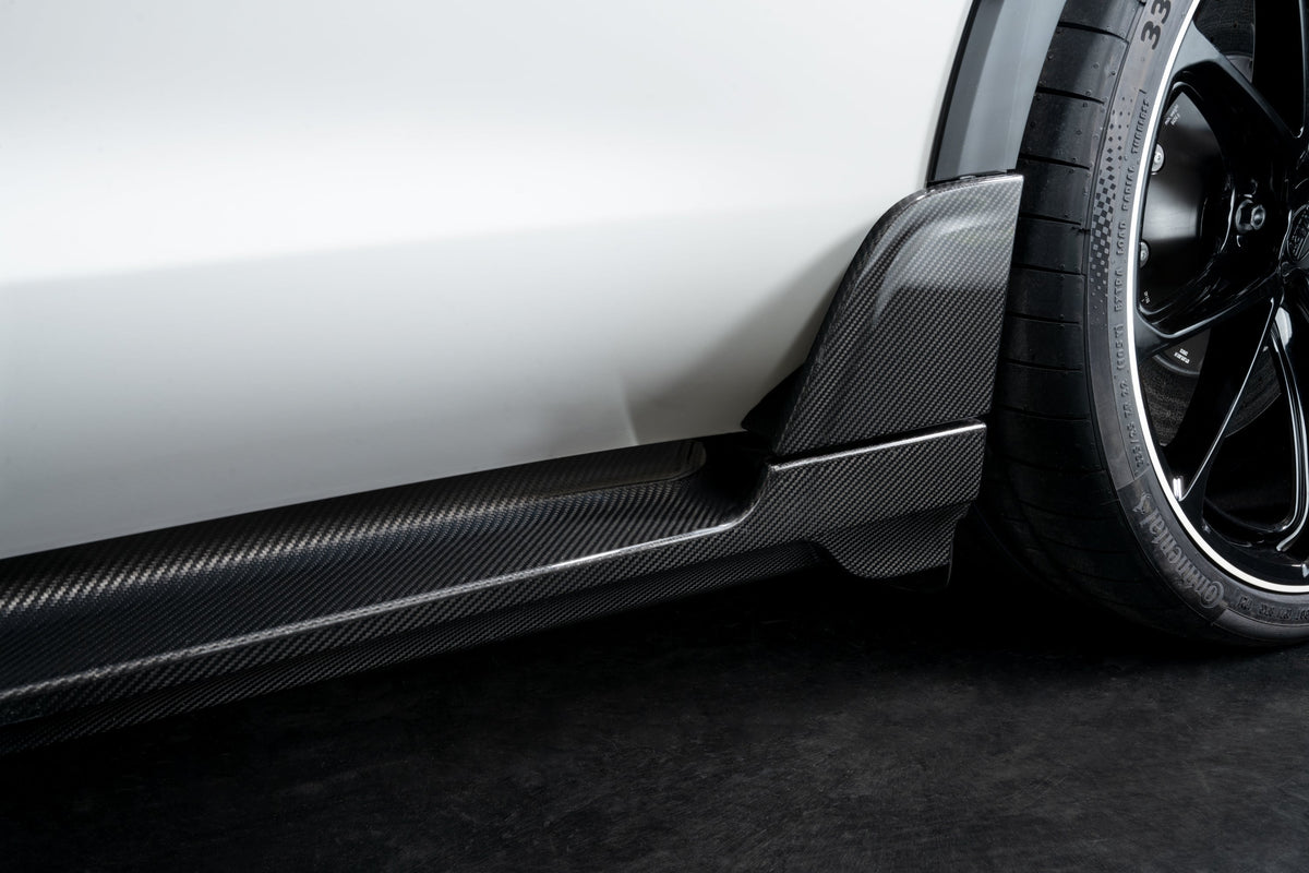 TECHART carbon side skirts on Porsche Taycan
