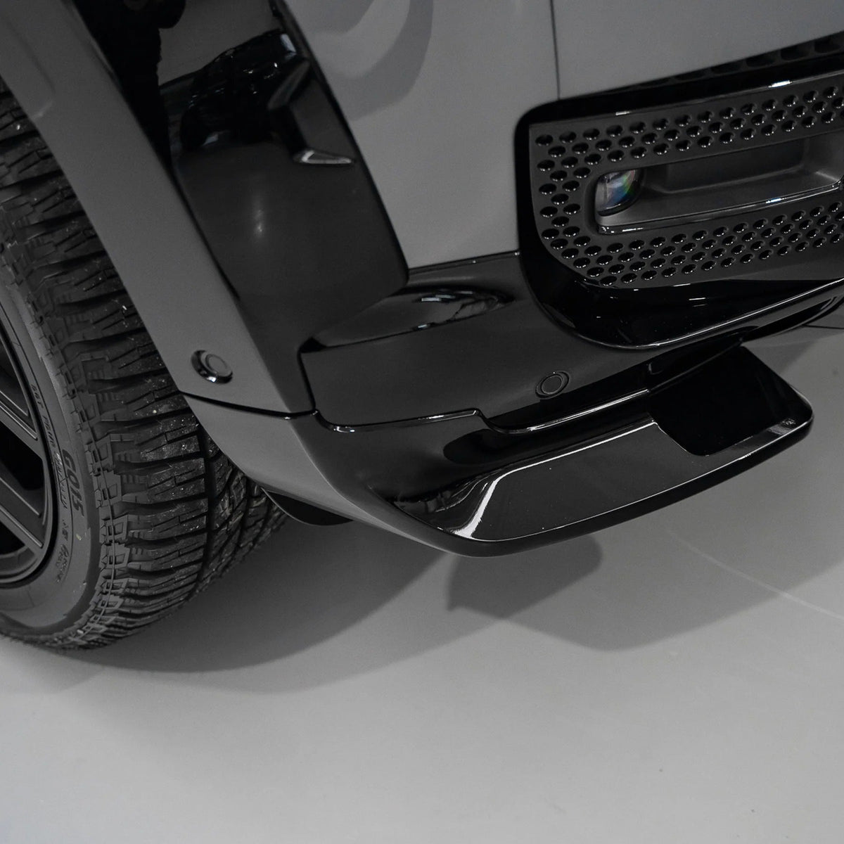 Urban aero canards installed on Defender front bumper