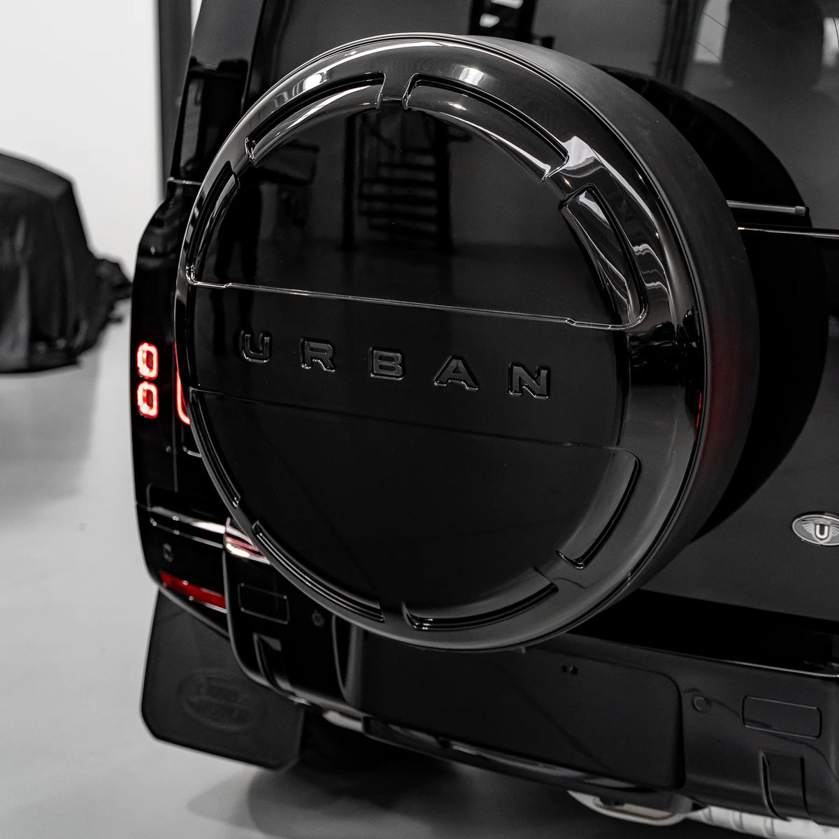 Urban spare wheel cover installed on Defender tailgate