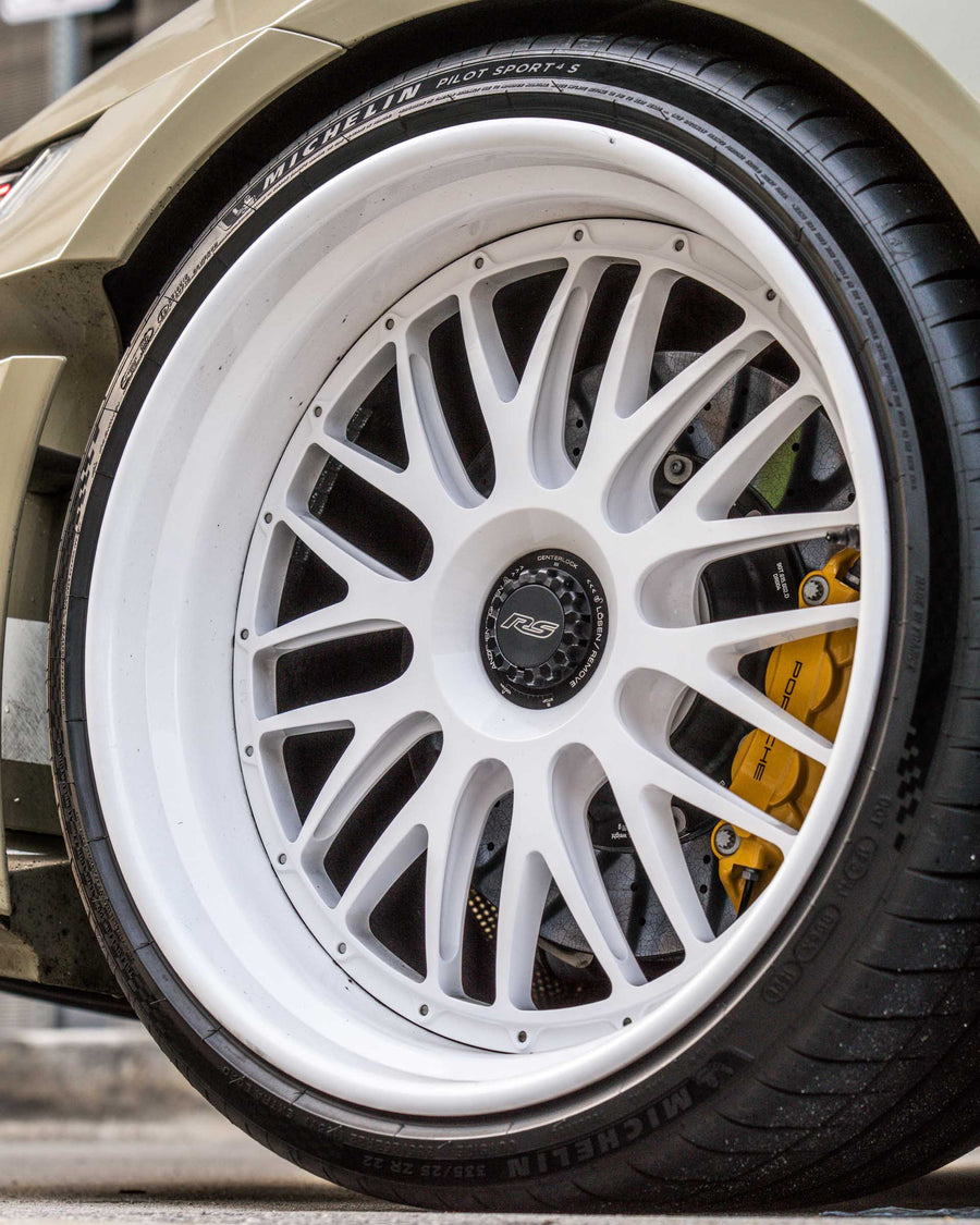 Porsche 911 992 GT3 RS on AL13 C008T forged wheels in Gloss Tesora White finish