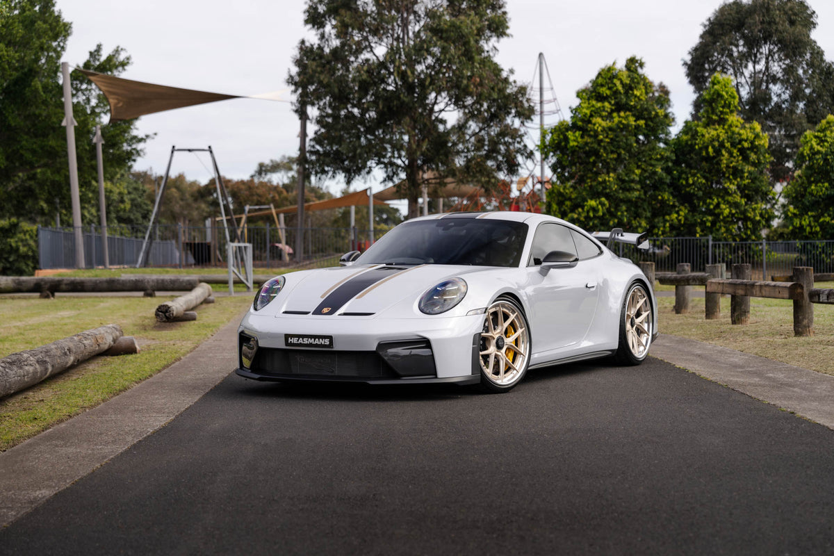 Porsche 911 992.2 GT3 on AL13 D004 forged wheels in Brushed Satin Competition Gold / Polished Gloss finish