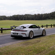 Porsche 911 992.2 GT3 on AL13 D004 forged wheels in Brushed Satin Competition Gold / Polished Gloss finish