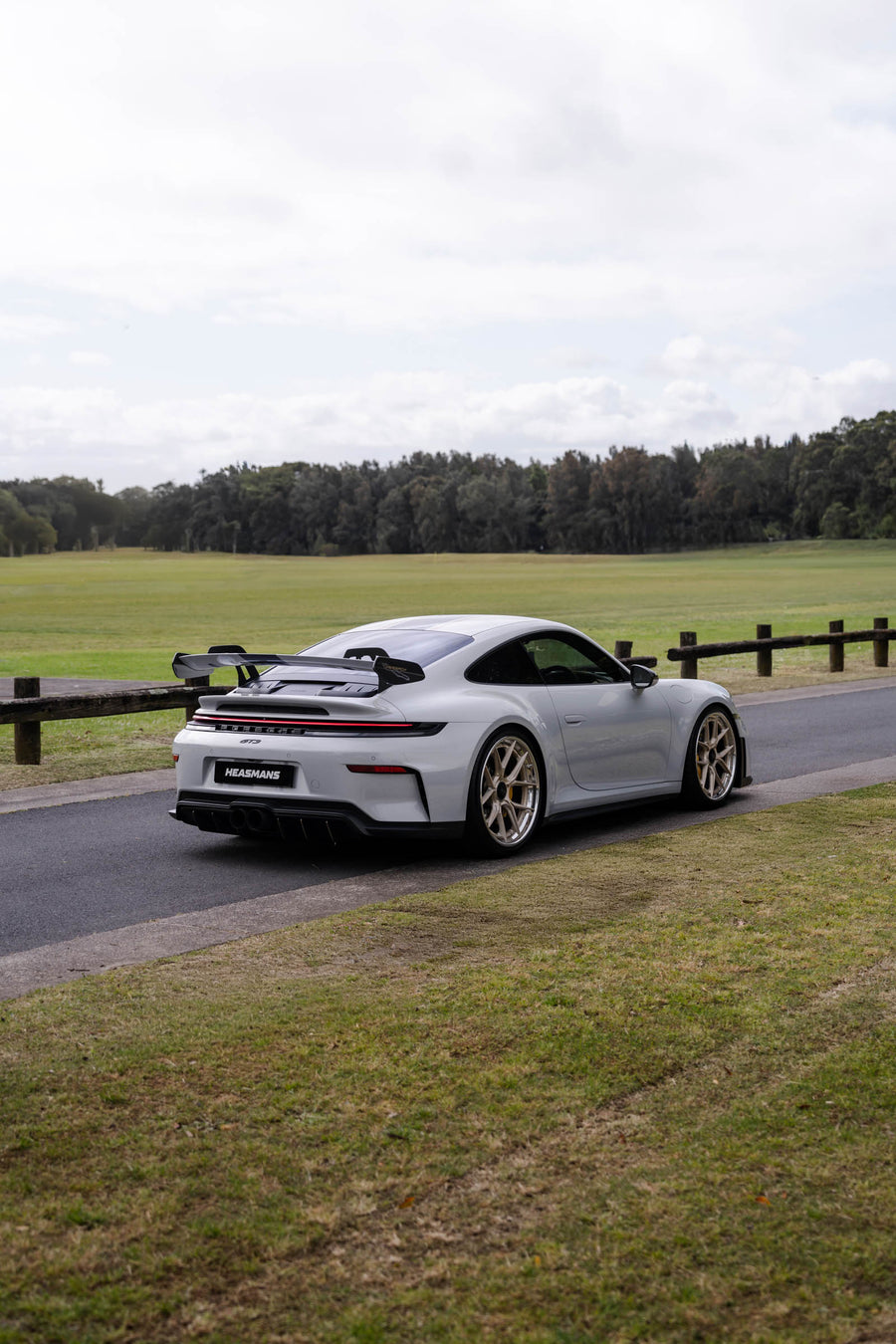 Porsche 911 992.2 GT3 on AL13 D004 forged wheels in Brushed Satin Competition Gold / Polished Gloss finish