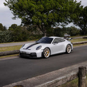 Porsche 911 992.2 GT3 on AL13 D004 forged wheels in Brushed Satin Competition Gold / Polished Gloss finish