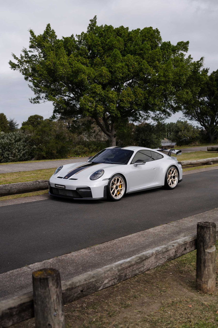 Porsche 911 992.2 GT3 on AL13 D004 forged wheels in Brushed Satin Competition Gold / Polished Gloss finish