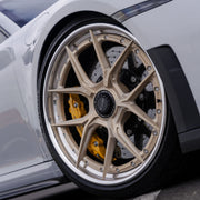 Porsche 911 992.2 GT3 on AL13 D004 forged wheels in Brushed Satin Competition Gold / Polished Gloss finish