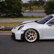 Porsche 911 992.2 GT3 on AL13 D004 forged wheels in Brushed Satin Competition Gold / Polished Gloss finish