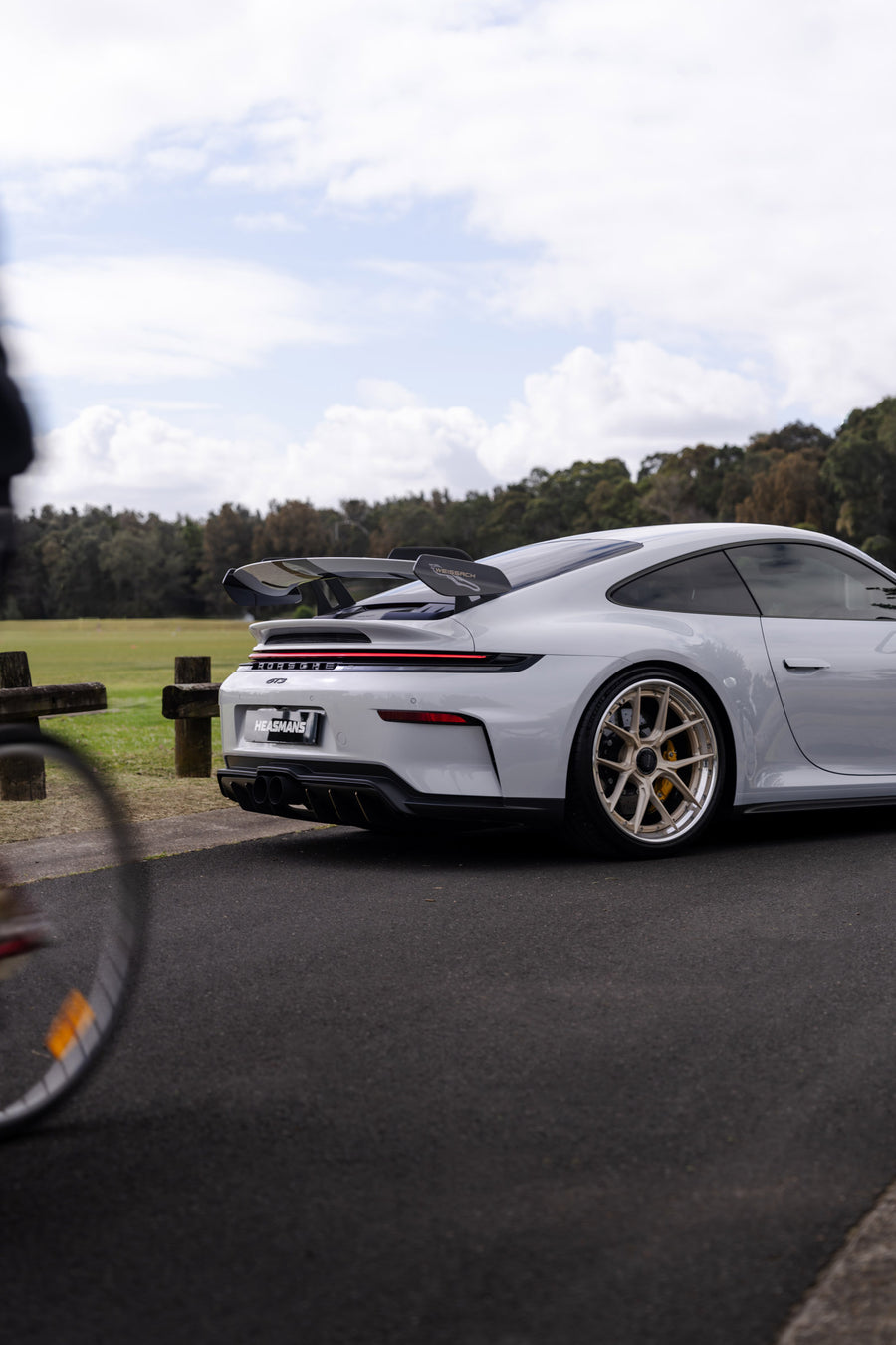 Porsche 911 992.2 GT3 on AL13 D004 forged wheels in Brushed Satin Competition Gold / Polished Gloss finish