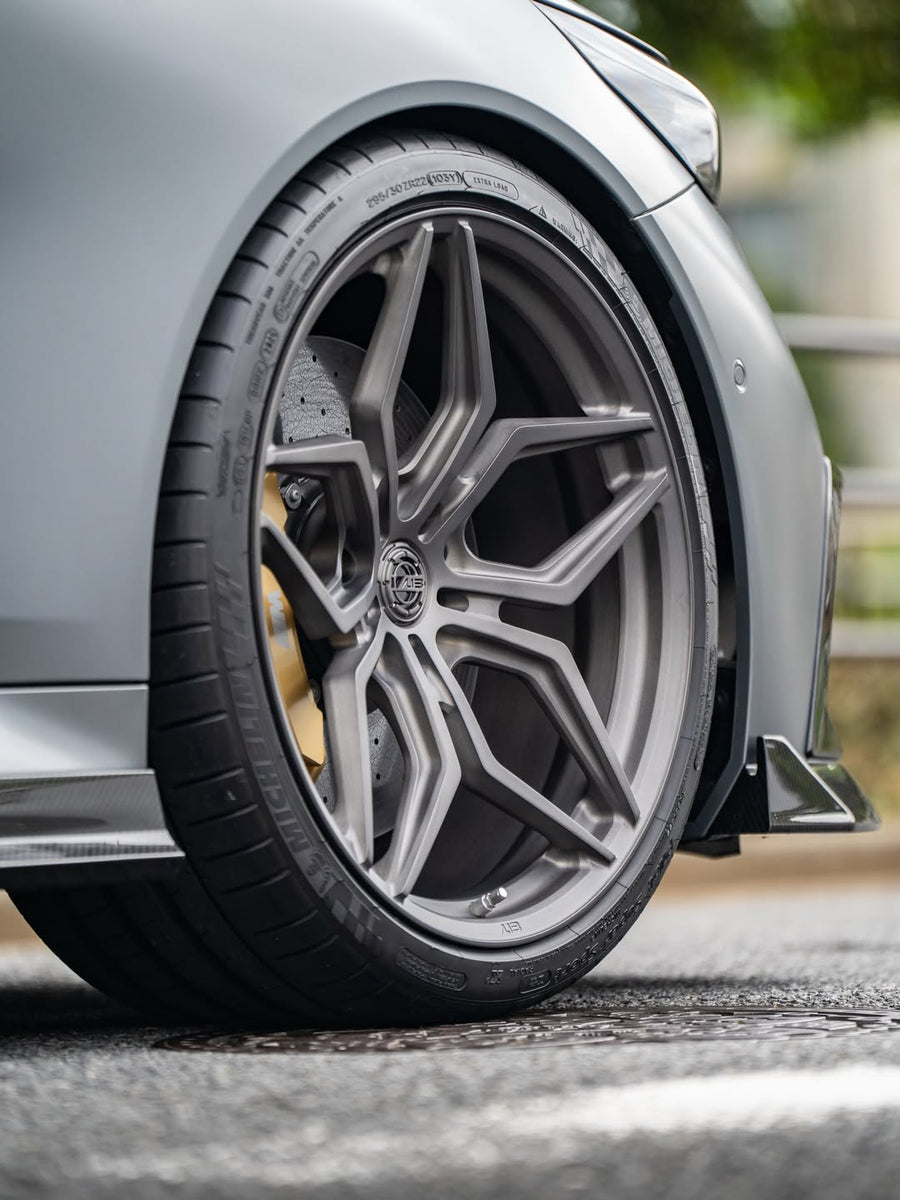 BMW G99 M5 on AL13 R70 forged wheels in Brushed Satin Shadow Grey finish