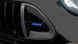 BRABUS carbon grille inserts with illuminated logo on Mercedes-AMG C63 W206